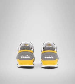SCARPA DIADORA JUNIOR N.92 PS 101.177716 C5888 GRIGIA - GIALLA -Corriviva Negozio 0055636 scarpa diadora junior n92 ps 101177716 c5888 grigia gialla